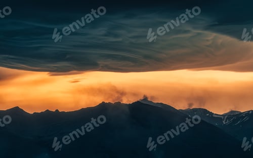 Preview: Dramatic of colorful sunset sky and Asperitas cloud over Icelandic mountain at Iceland