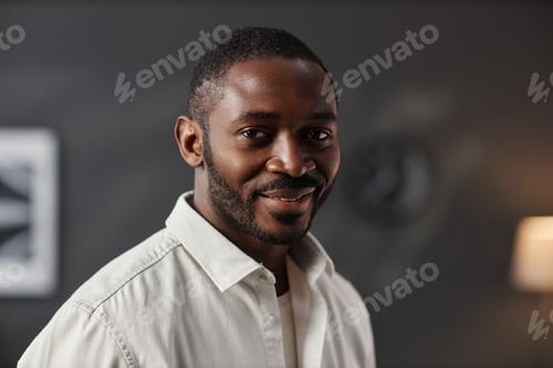 Preview: Confident Black Man Looking at Camera with Smile