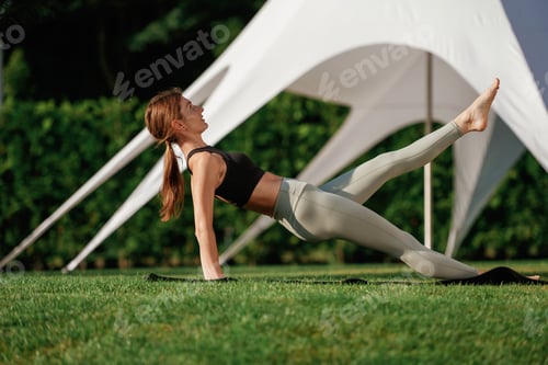 Preview: White tent behind. Fitness woman is outdoors, beautiful vacation place