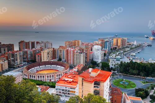 Preview: Malaga, Spain dawn skyline towards the Mediterranean Sea
