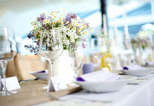 Elegant Table Setting with Floral Centerpiece for Wedding
