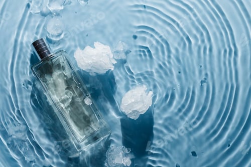 Preview: Perfume bottle on blue water wavy background with ice pieces. Fresh chilly water fragrance concept