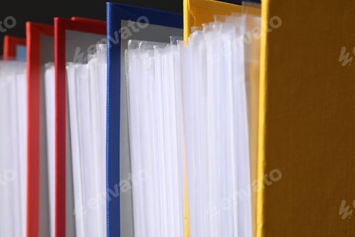 Preview: Colorful binder office folders as background, closeup