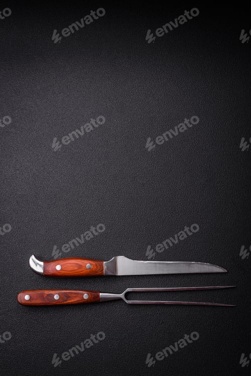 Preview: Kitchen knife and fork made of steel with copy space