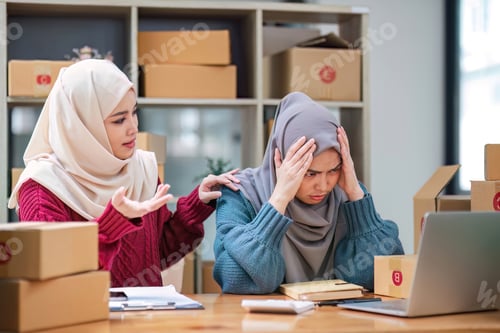 Preview: Muslim woman freelancer sme business online online start up business team having an argument about