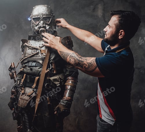 Preview: Makeup artist corrects helmet of actor in stalker costume