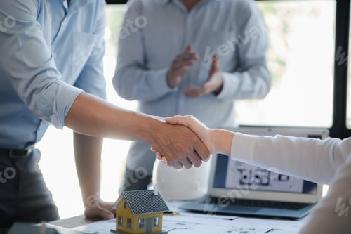 Preview: Team engineers and architects shake hands with the condo project owners after the meeting to present