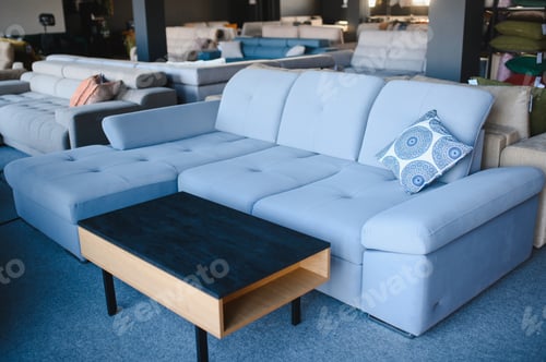 Preview: Sectional sofa and coffee table in a furniture showroom