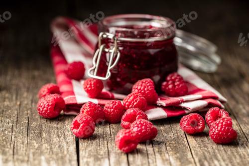 Preview: Sweet raspberry jam and raspberries.