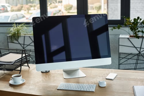 Preview: Digital oasis: a desktop computer ascends on wooden workspace