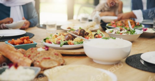 Preview: Food, table and feast with gathering for dinner or breaking fast in Ramadan with family in house. P