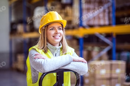 Preview: Portrait of a young woman warehouse worker.