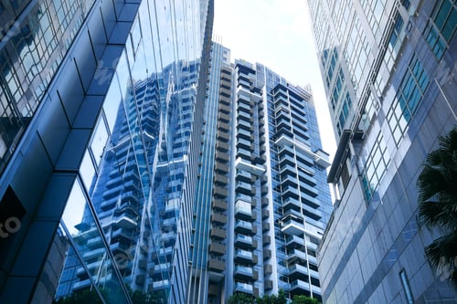 Preview: low angle view of singapore city buildings.