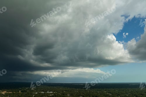 Preview: Landscape of dark ominous clouds forming on stormy sky before heavy thunderstorm
