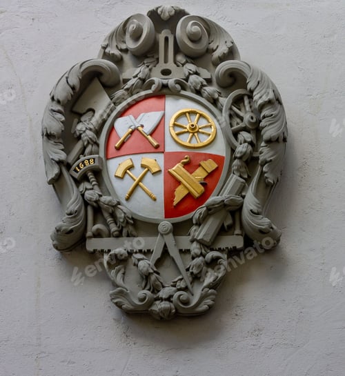 Preview: Vertical shot of coat of arms on the facade of a historical building in Bern, Switzerland
