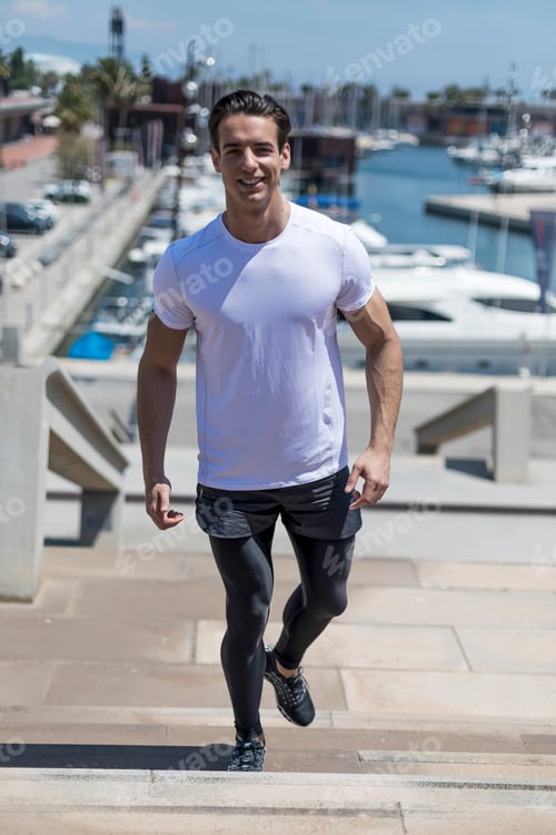 Preview: Young man doing interval workout on stairs