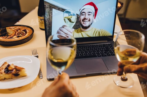 Preview: close up. Cheerful man greeting parents during online Christmas celebration.