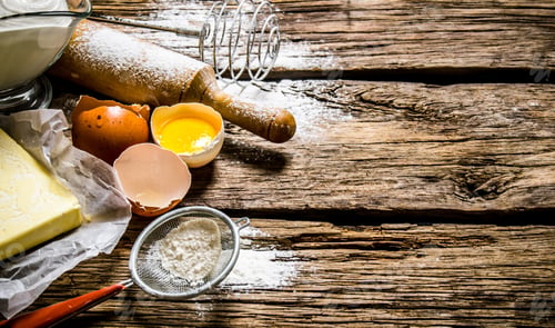 Preview: Preparation of the dough. Ingredients for the dough - egg, flour, butter with a rolling pin .