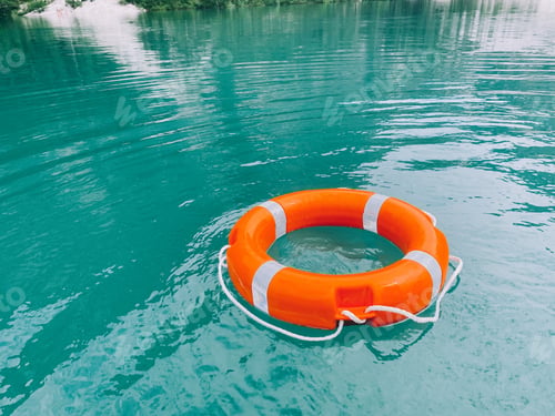 Preview: Safety buoy on emerald green water