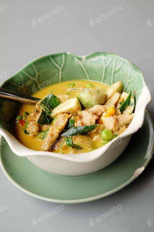 Preview: Thai Green Pork Curry On A Gray Background.