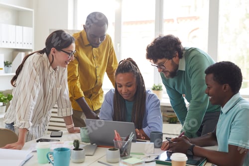 Preview: Diverse Business Team Collaborating in Office