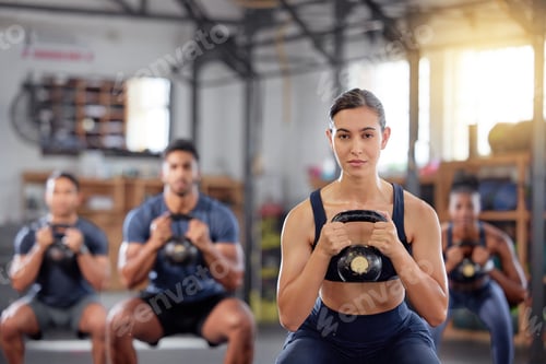 Preview: Kettlebell squats, fitness and training group of healthy people living an active health, wellness a