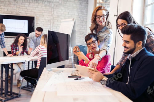 Preview: Picture of young architects discussing in office