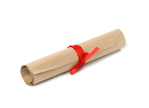 Preview: Rolled up roll of brown kraft paper and tied with red ribbon
