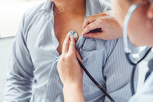 Preview: Doctor Measuring arterial blood pressure man patient Health care in hospital