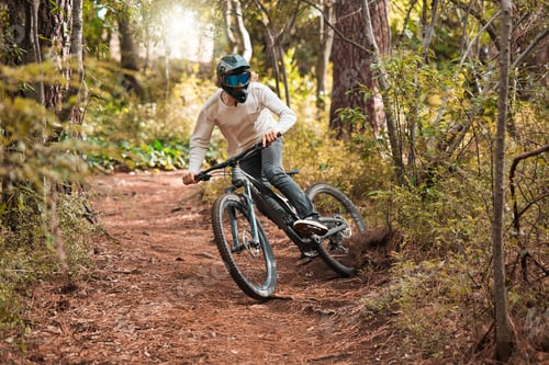 Preview: Man cycling, forest and fitness sport for healthy lifestyle training. Cyclist cardio exercise worko