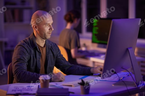 Preview: Caucasian Man Working On Computer