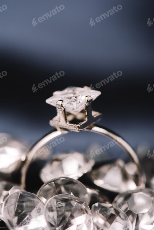 Preview: selective focus of engagement ring with shiny diamond