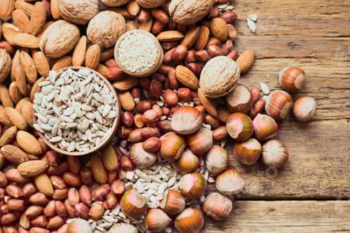 Preview: Mixed Nuts and Seeds on a Wooden Table
