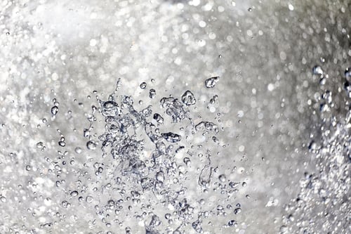 Preview: Clean refreshing water, water drops. Hygiene and hydration concept. Closeup frozen motion.
