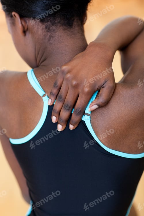 Preview: Woman with painful backache after working out
