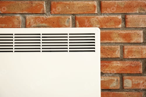 Preview: Heating convector on brick wall, closeup view