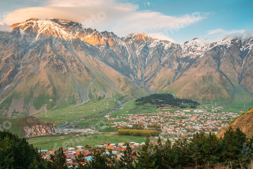 Preview: Stepantsminda Village At Sunny Evening Sunset In Kazbegi District, Mtskheta-Mtianeti Region, Georgia