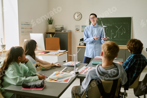 Preview: Caucasian Middle Aged Woman Teaching Diverse Teenagers in Classroom Setting