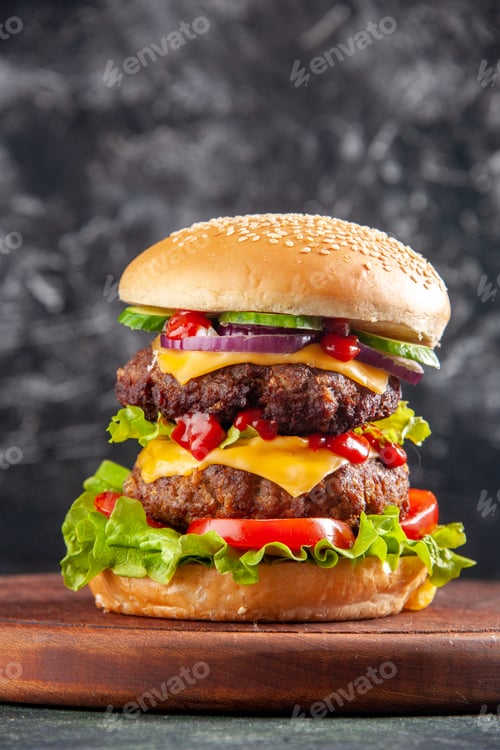 Preview: Top view of tasty sandwich on wooden board on dark color background