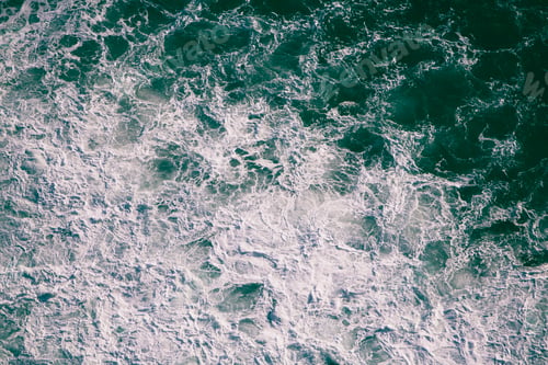 Preview: Overhead view of crashing wave and surf on the coast of Oregon