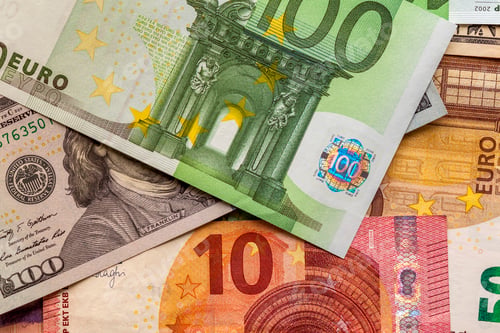 Preview: Money and finances concept. One hundred euro new bill on colorfu