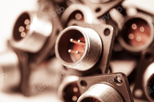 Preview: Close-up blurry metal sockets for plugs