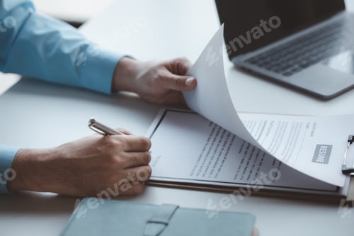 Preview: A person attends a job interview with a manager to join a company, he holds a resume and interview w