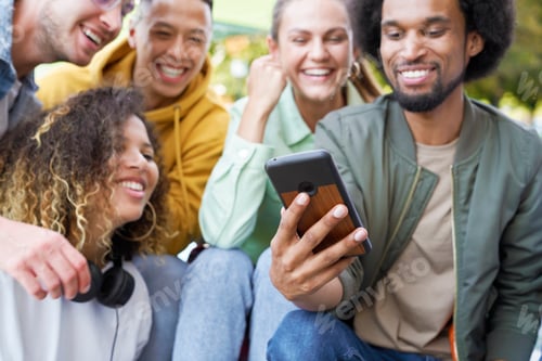Preview: Close up of group of happy people sitting with phone