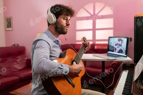 Preview: Man playing online music with guitar