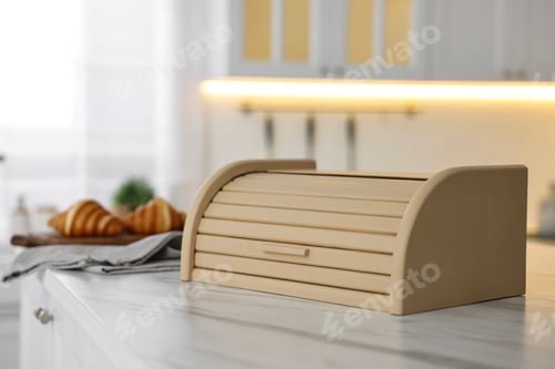 Preview: Wooden bread box on white marble countertop in kitchen