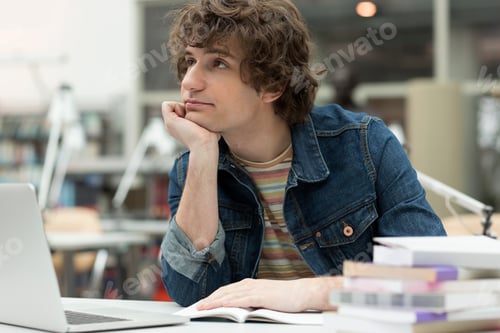 Preview: Distracted student in a university library