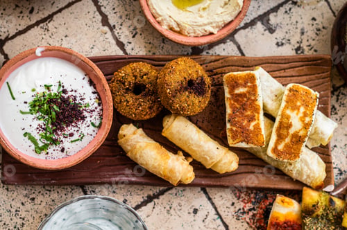 Preview: Fried cheese and falafel with sause in Turkish Village Breakfast. Top view
