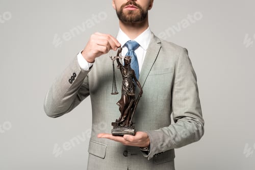 Preview: partial view of lawyer holding themis statue isolated on grey