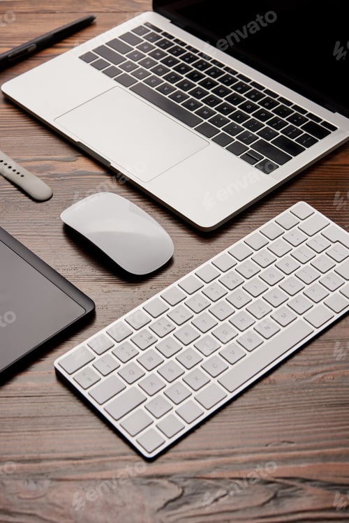 Preview: partial view of various gadgets on graphics designer workplace